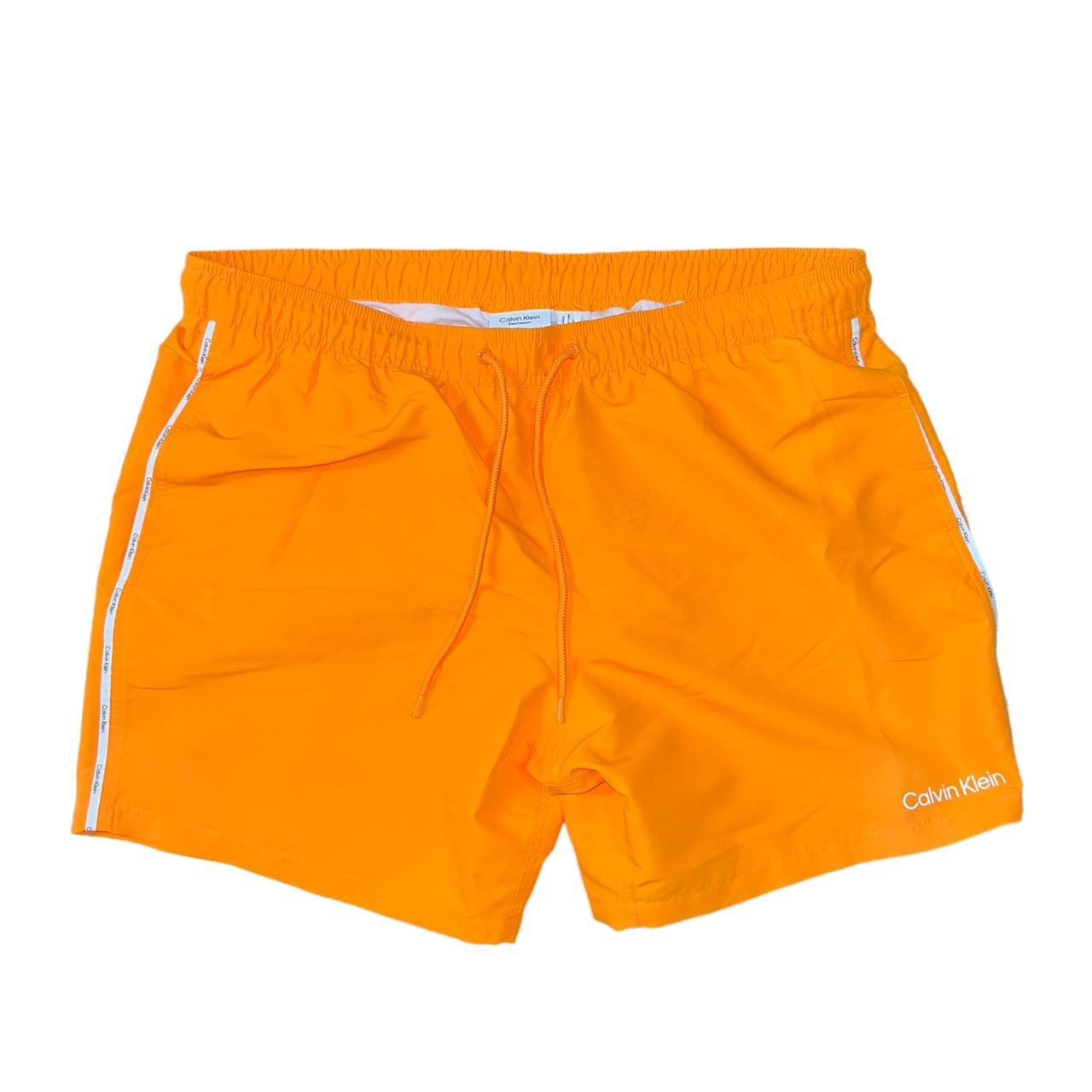 Men’s Calvin Klein Chubby Neon Orange Swim trunks 🩳... - Depop