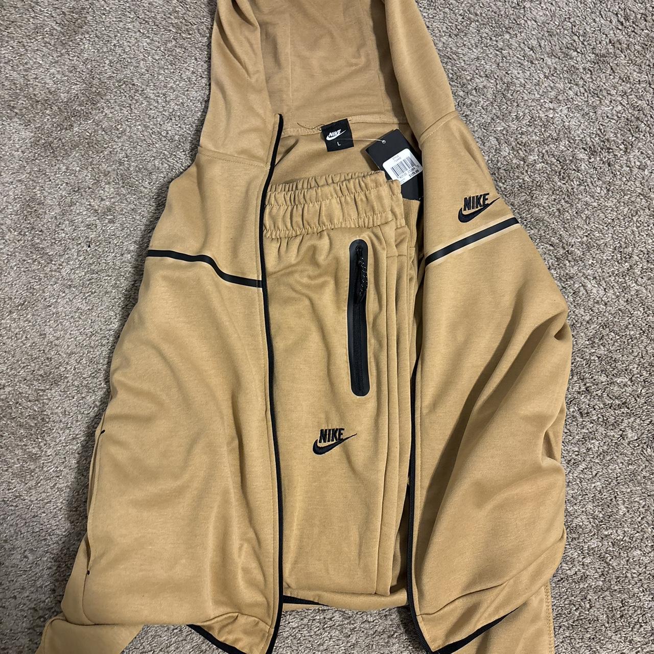 tan nike tech suit
