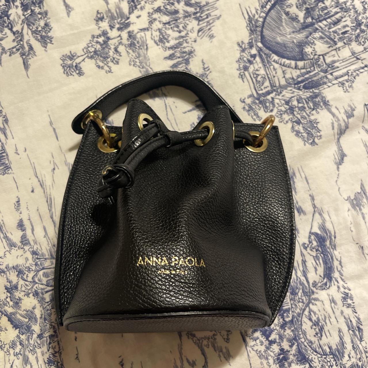 Anna selling Paola leather bucket bag