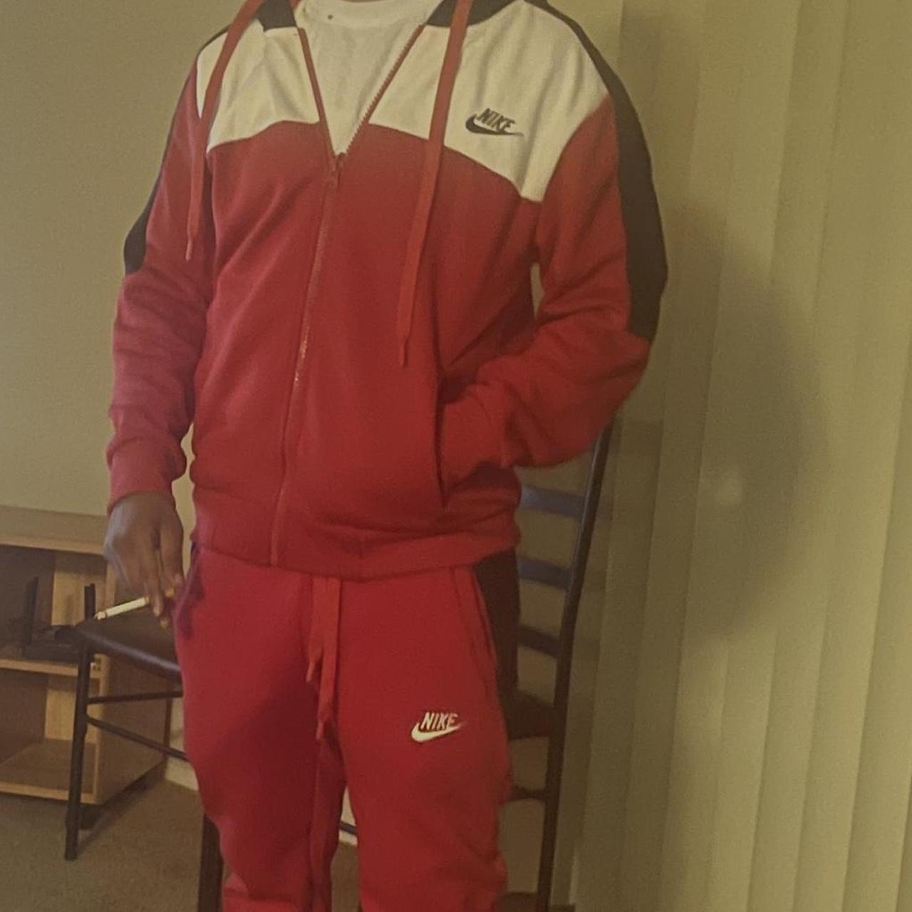 red and white nike jumpsuit