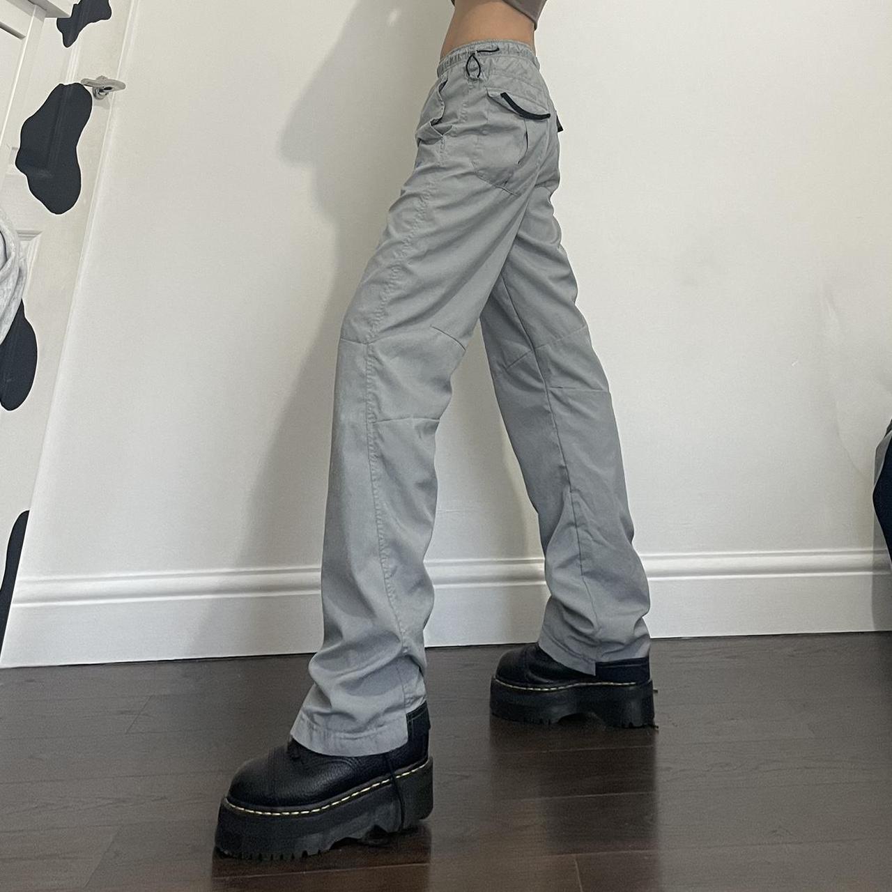 Grey Nike cargo track pants with toggle drawstring... Depop