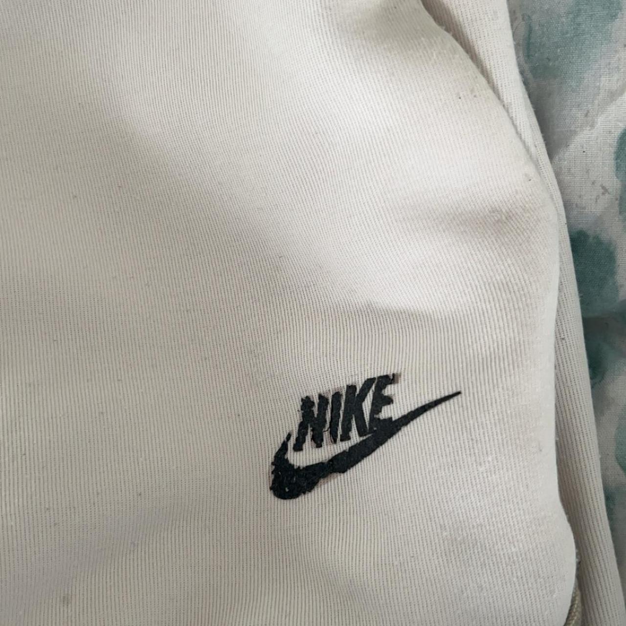nike tech cream joggers
