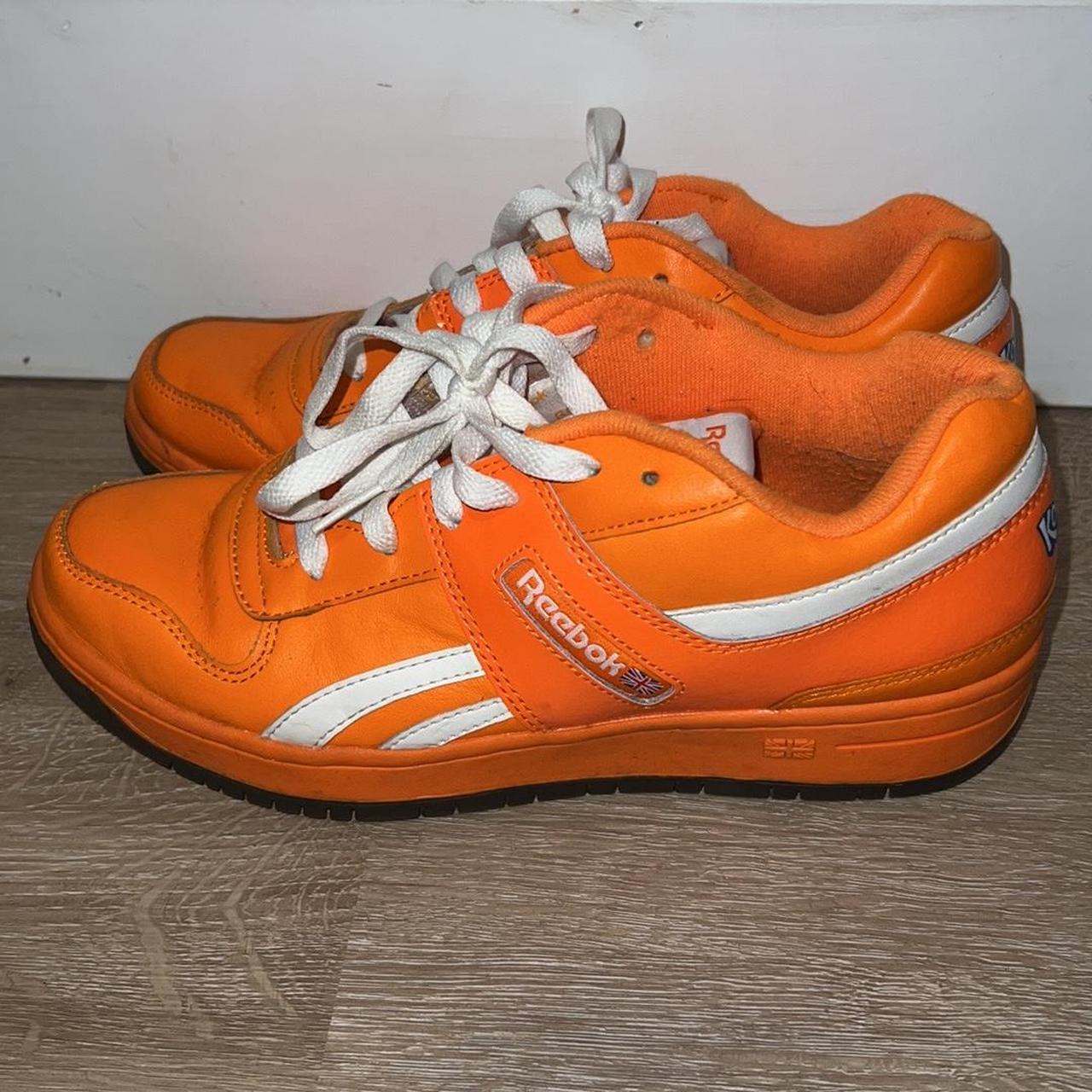 Orange reebok shoes on sale