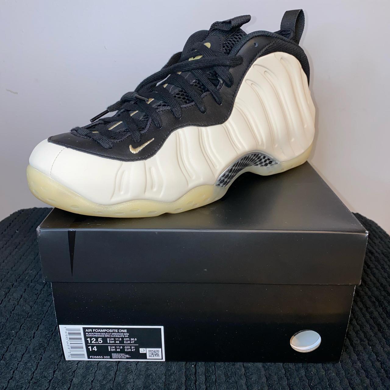 black and gold foamposite size 14