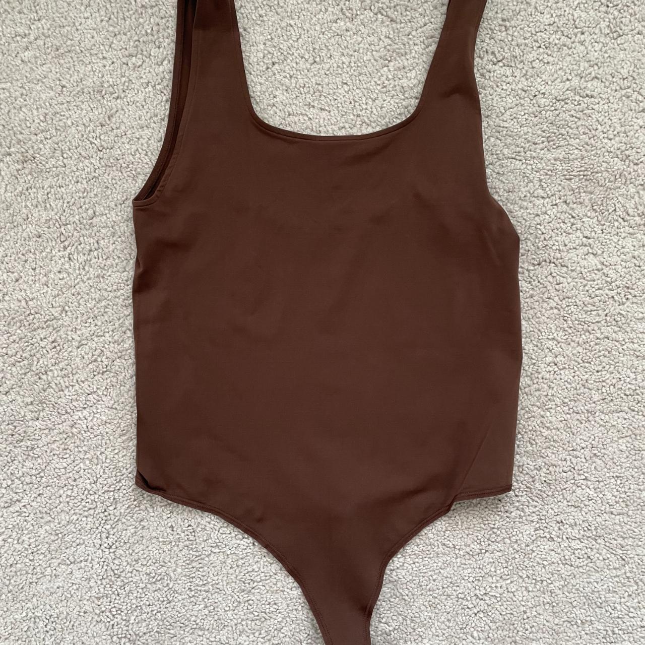 Skims dark brown body suit never worn - Depop