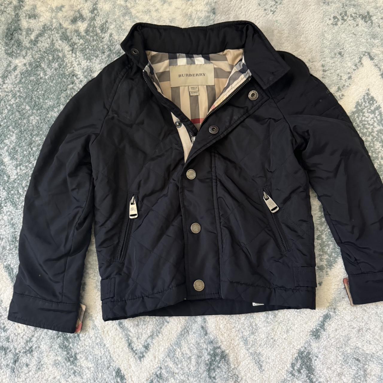 Authentic Burberry unisex black quilted jacket for 6. Depop