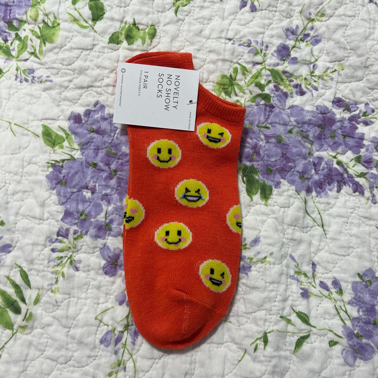 Sock with smiley faces - Depop