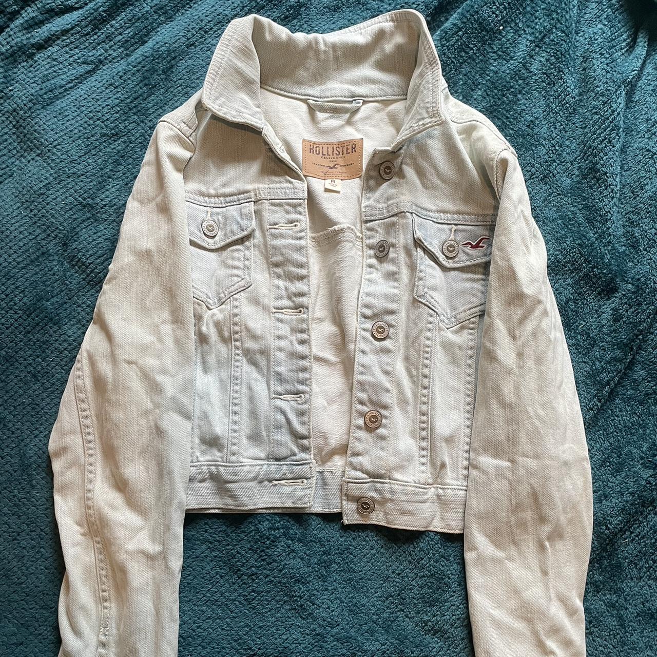 Blue hollister cropped denim jacket, small stain as... Depop