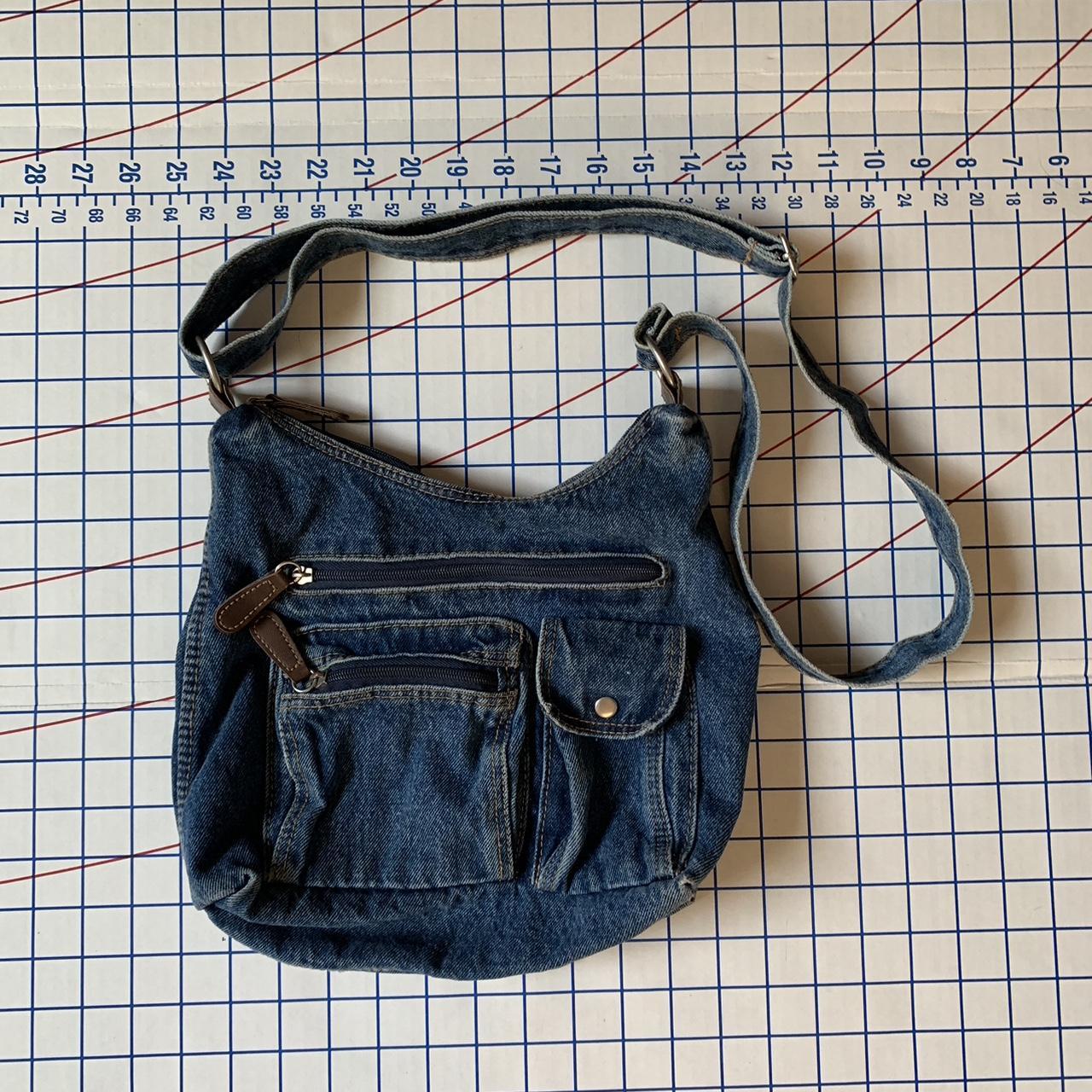 denim hobo messenger bag. lots of pockets and plenty... Depop