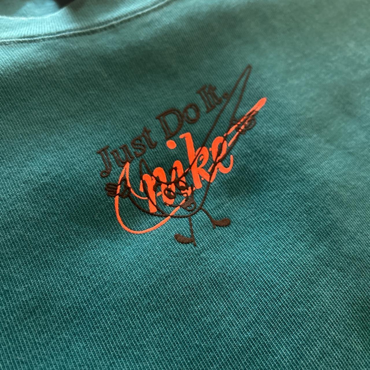womens teal nike shirt