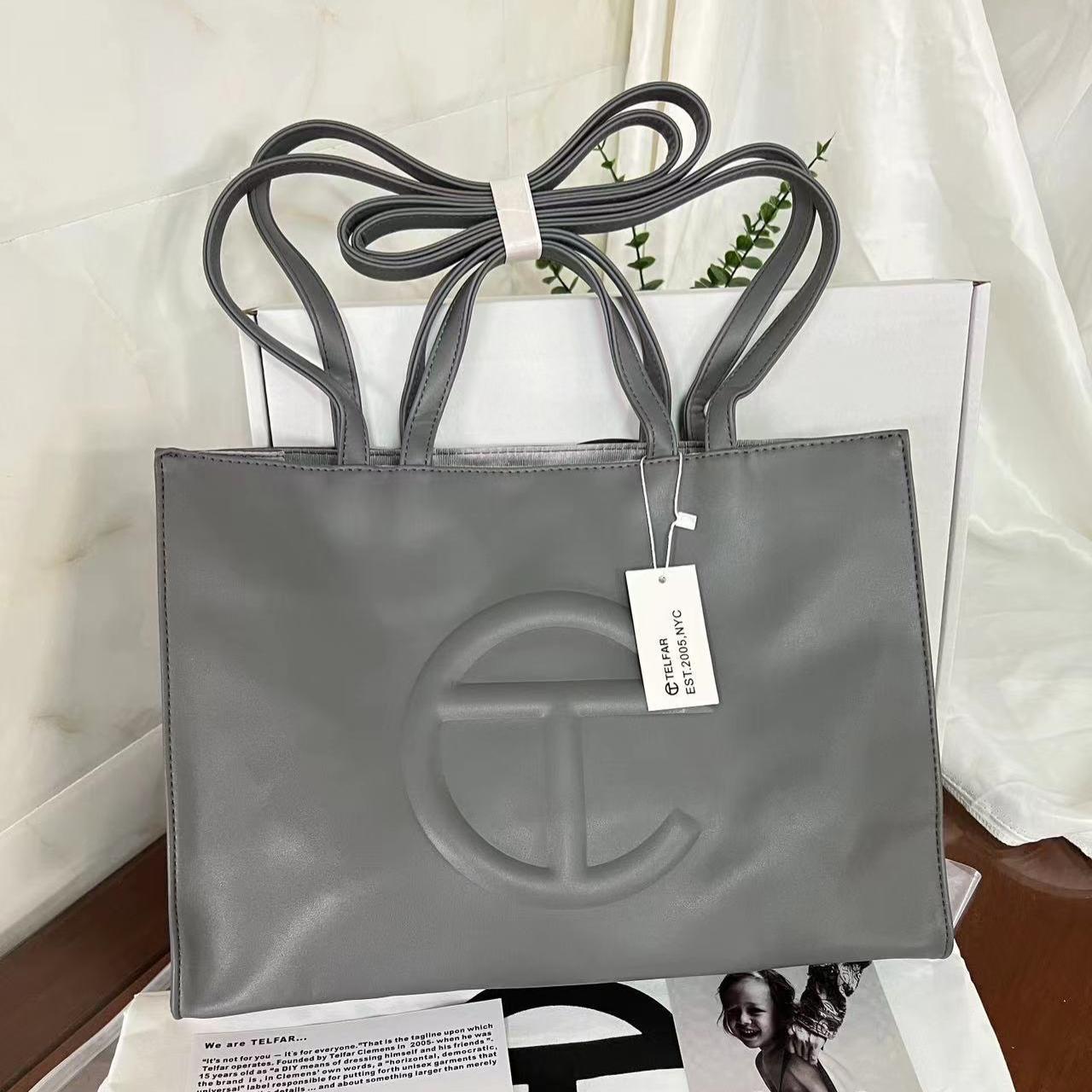 Medium telfar bag on sale silver