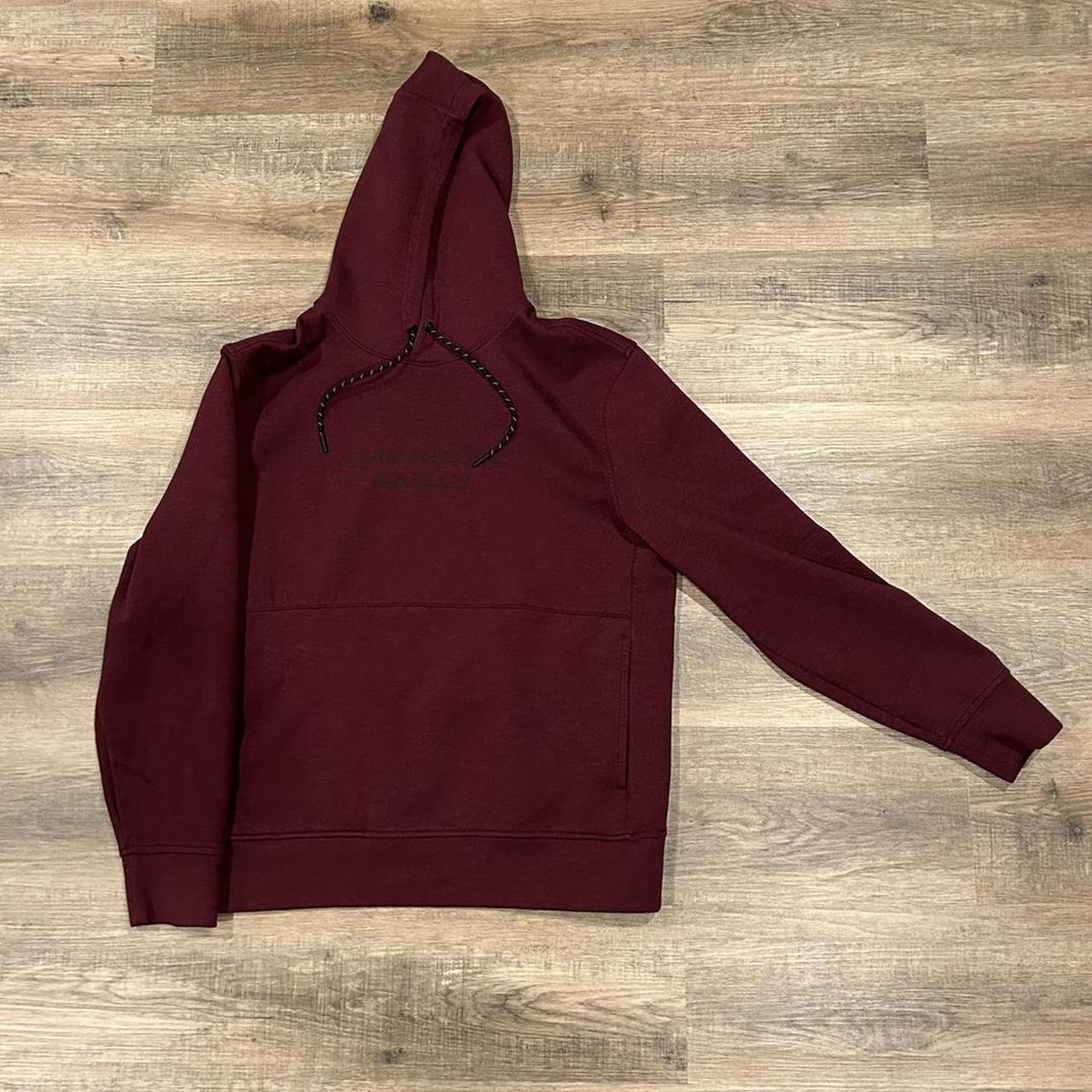 Burgundy American eagle hoodie In almost brand new