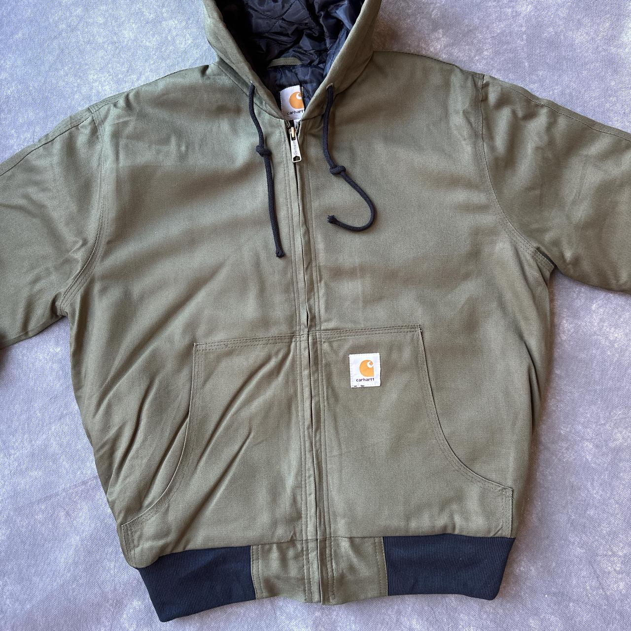 Reworked vintage olive green carhartt patchwork... Depop