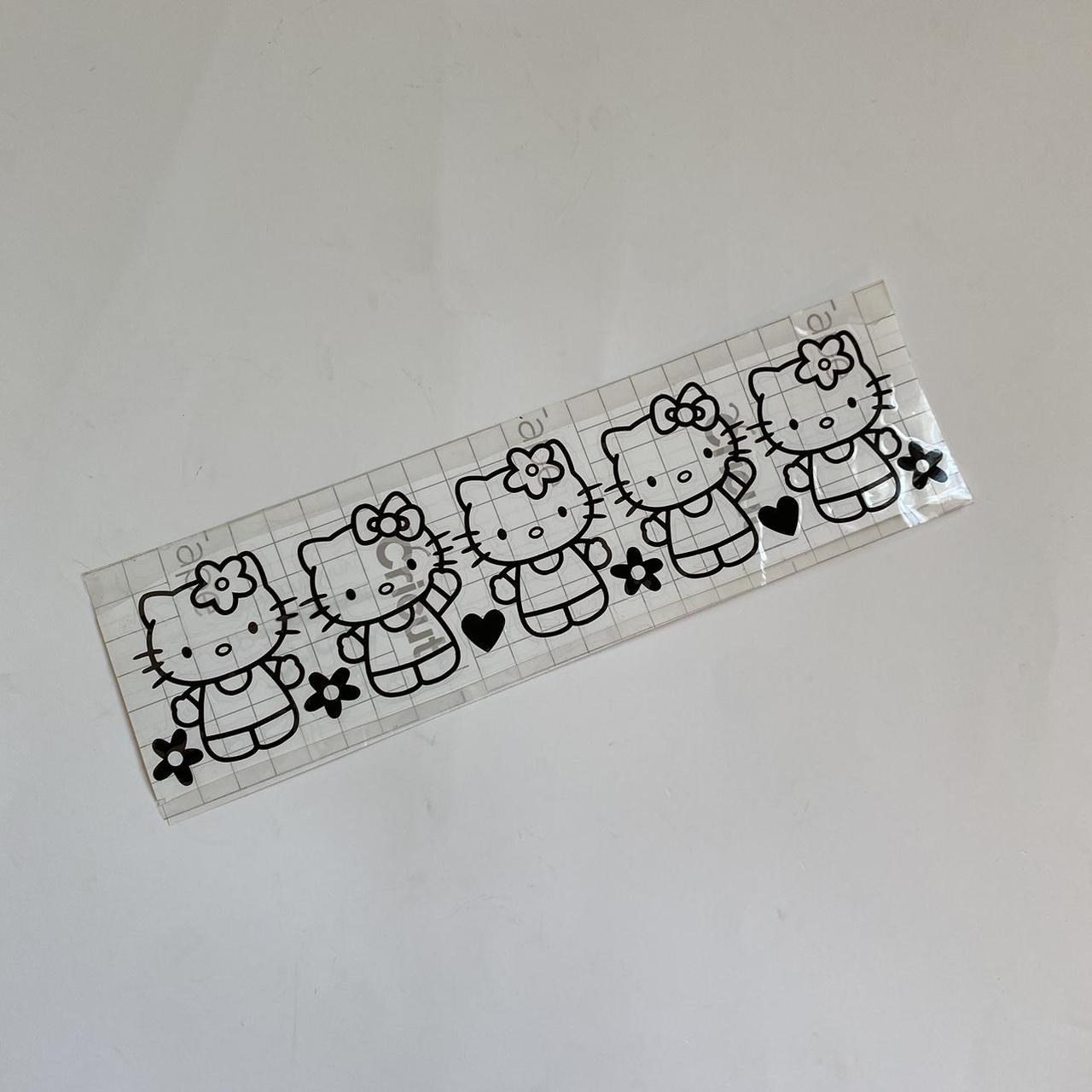 Hello Kitty black waterproof vinyl wraparound - Depop