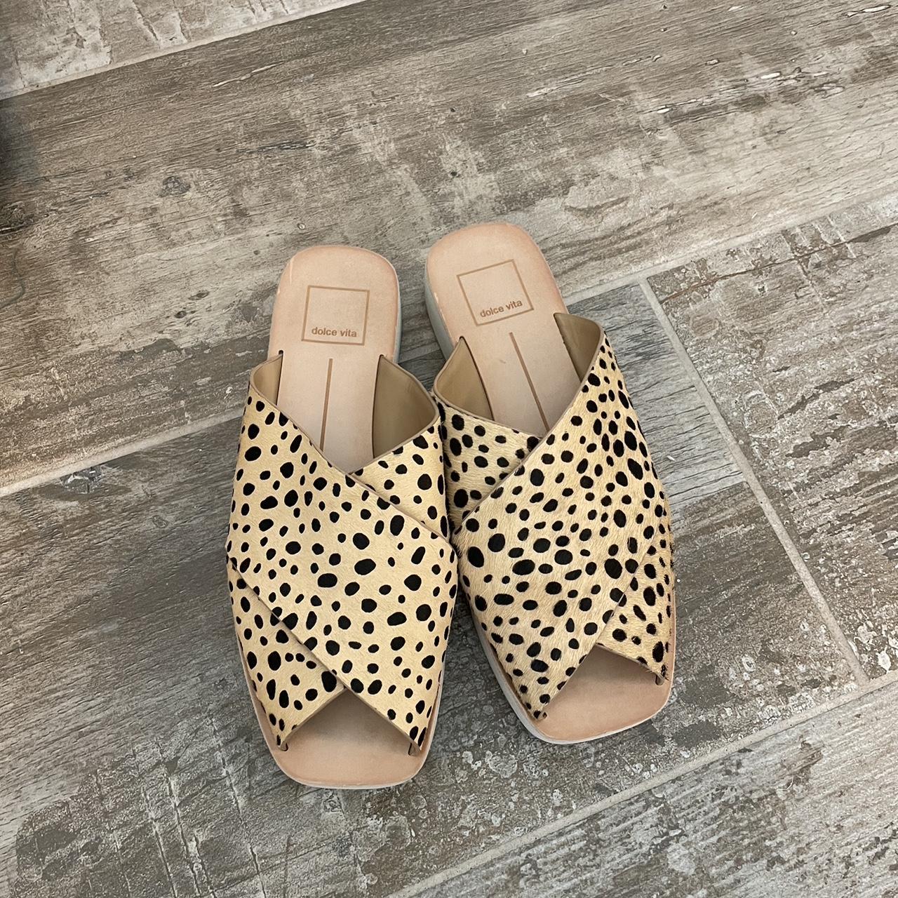 Tan and black leopard print sandals with a slight