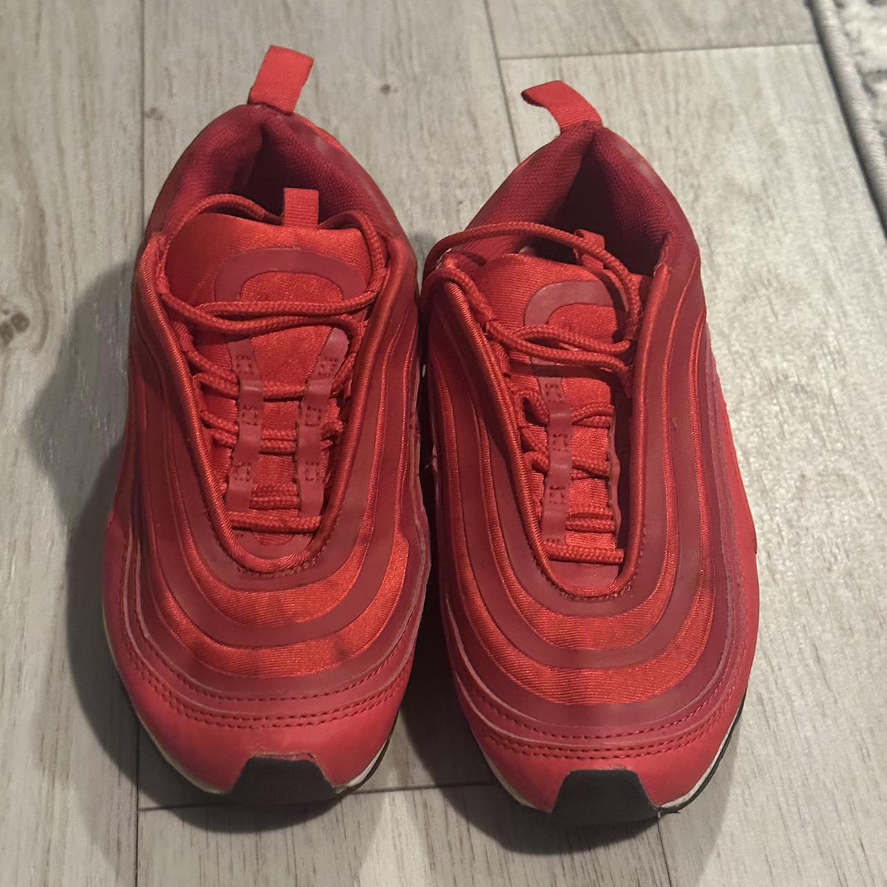 All red shop air max 97s