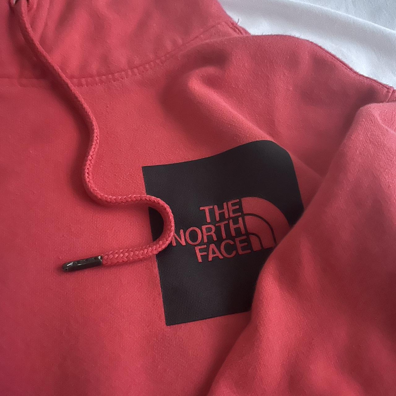 red the north face hoddie - Depop