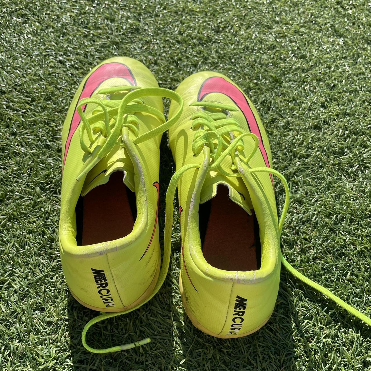 yellow and pink nike football boots