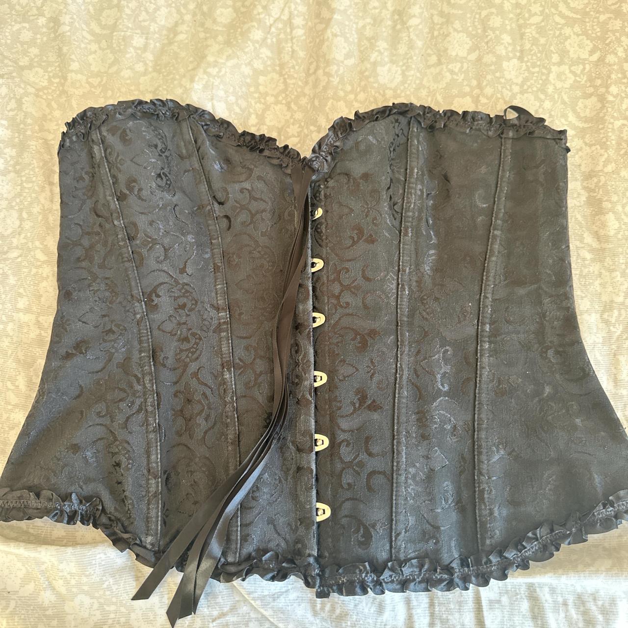 black corset - the end of string is mess up a little... - Depop