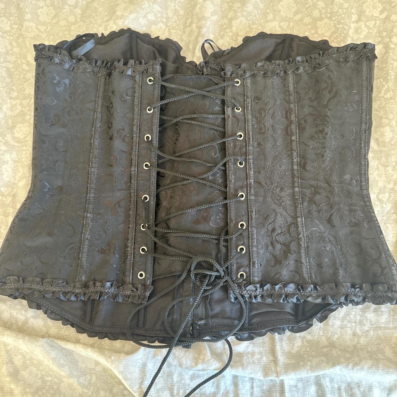 black corset - the end of string is mess up a little... - Depop