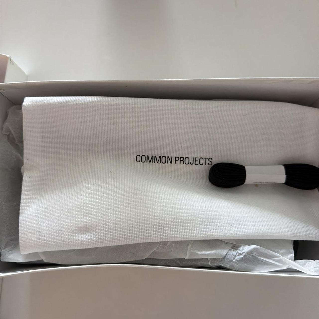 Common projects men's white and black trainers