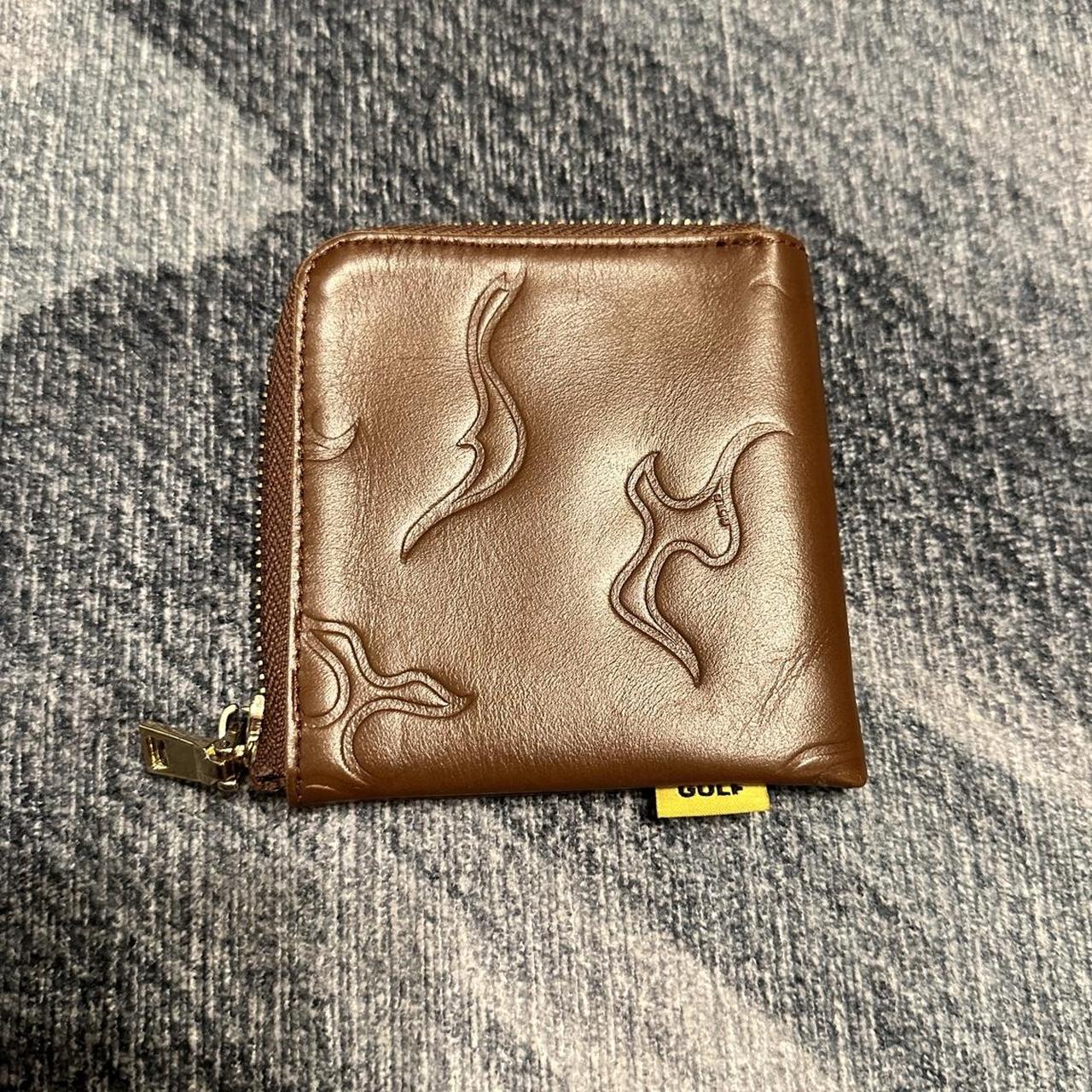 Brown Golf wang zip up flame wallet In very good... Depop