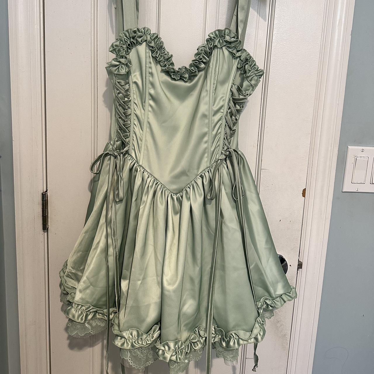 Brand new pastel green corset dress with tie straps... Depop