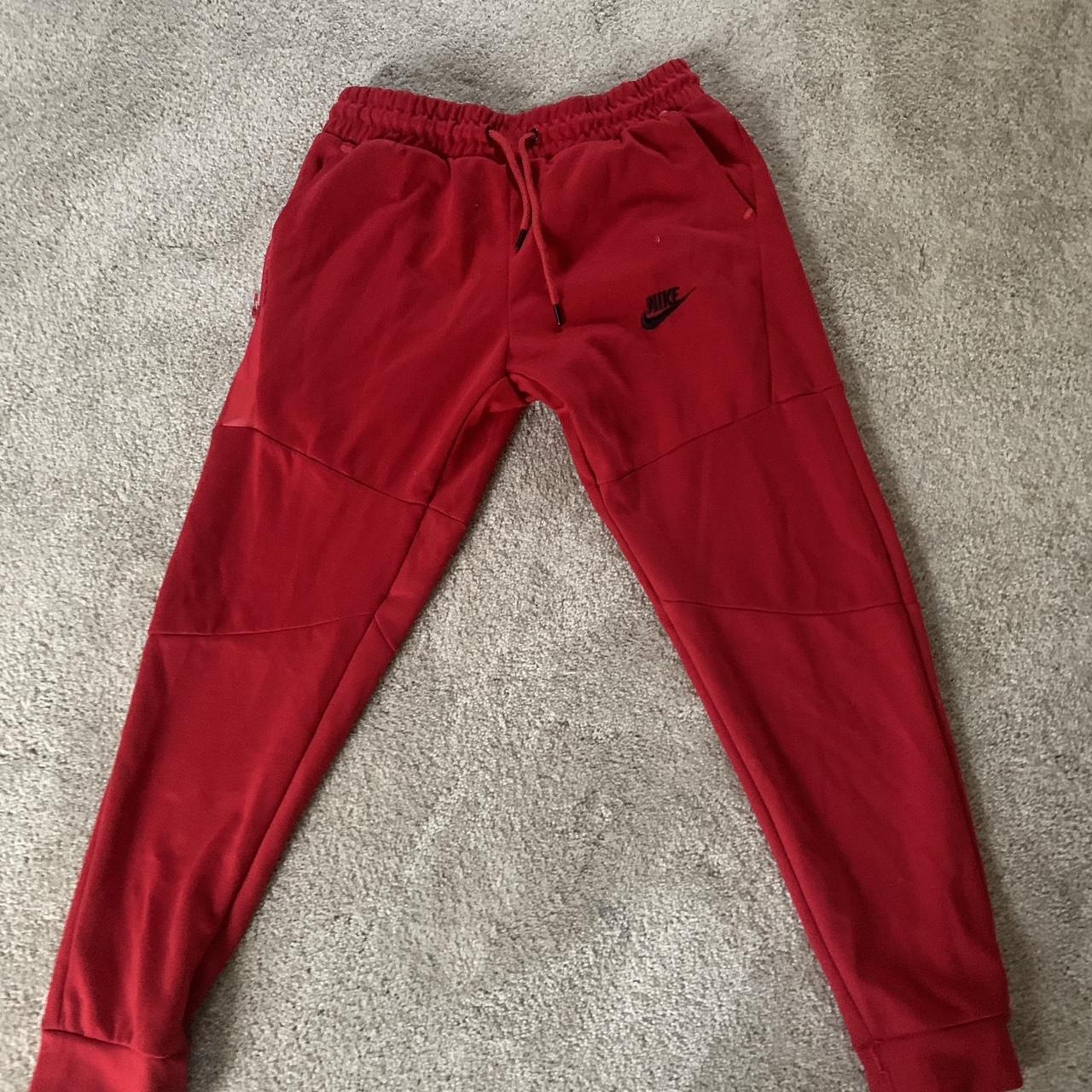 red nike sweatpants