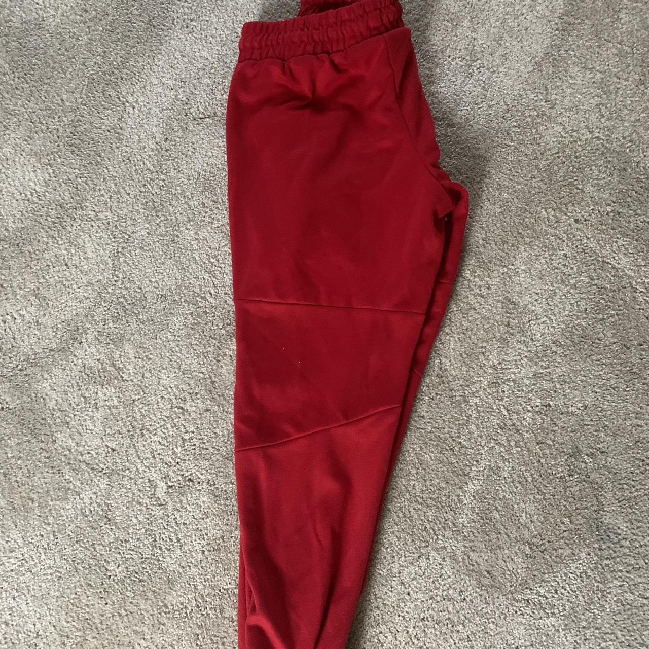 red nike sweatpants