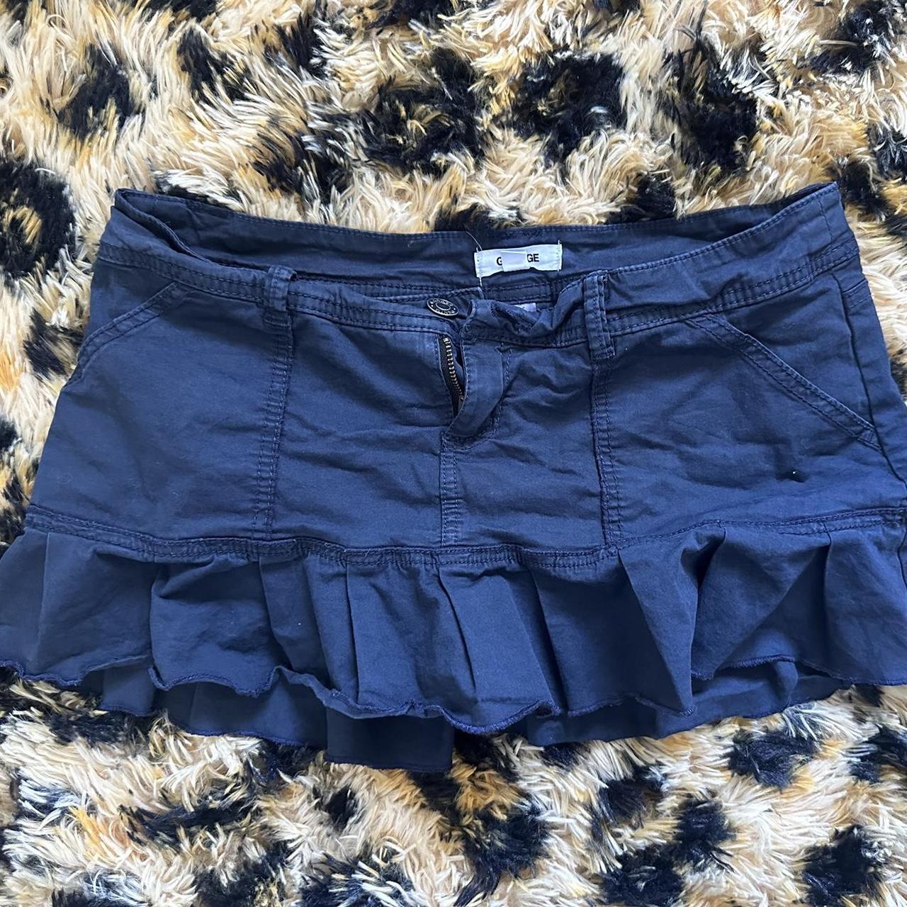 Pleated navy mini skirt with built in shorts from... - Depop