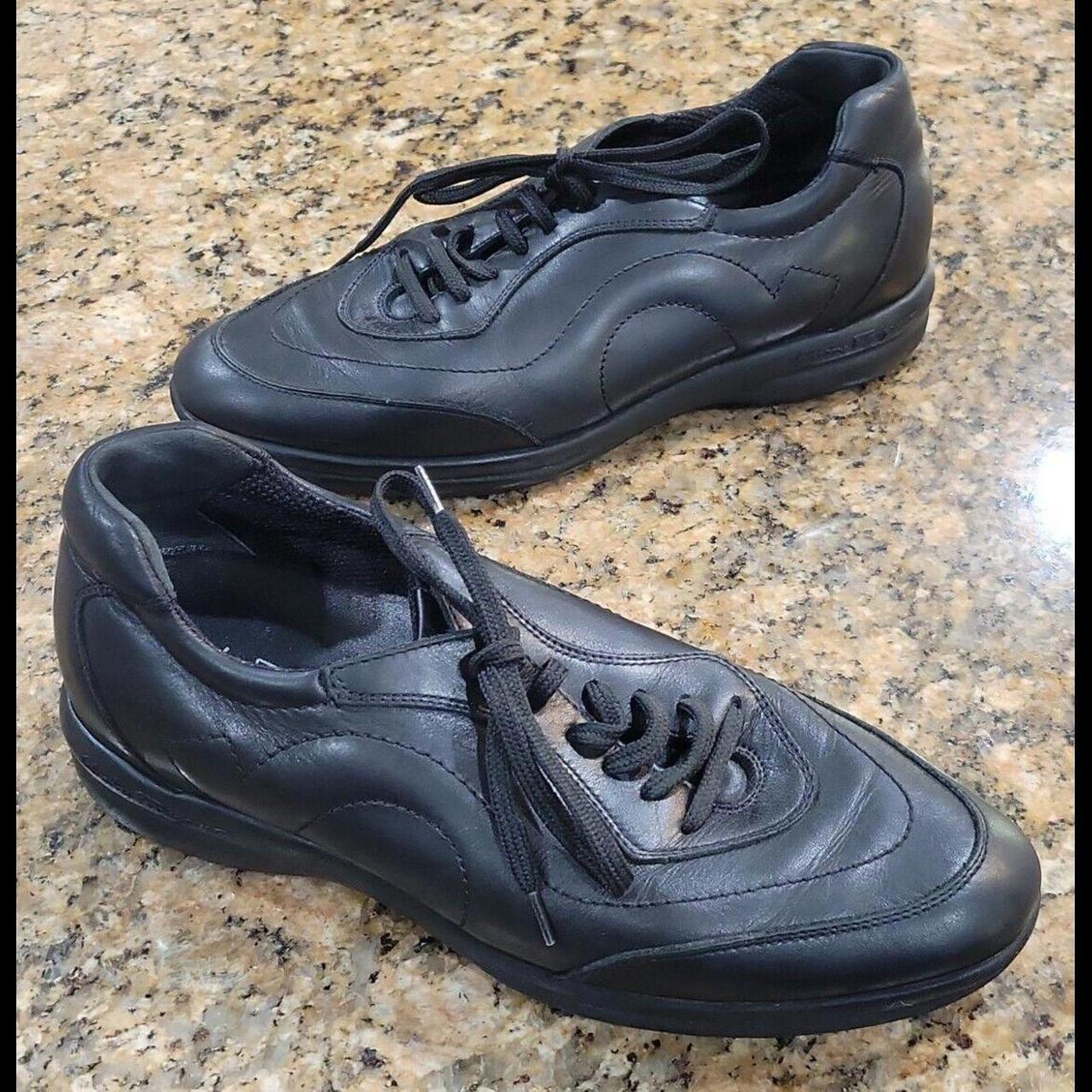 SALVATORE FERRAGAMO BLACK LEATHER SNEAKERS Depop
