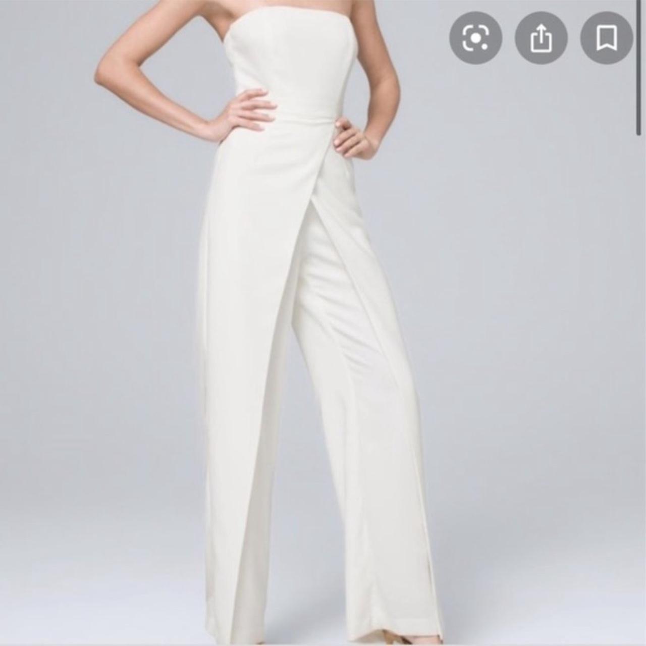 White House Black Market white jumpsuit. This is a... Depop
