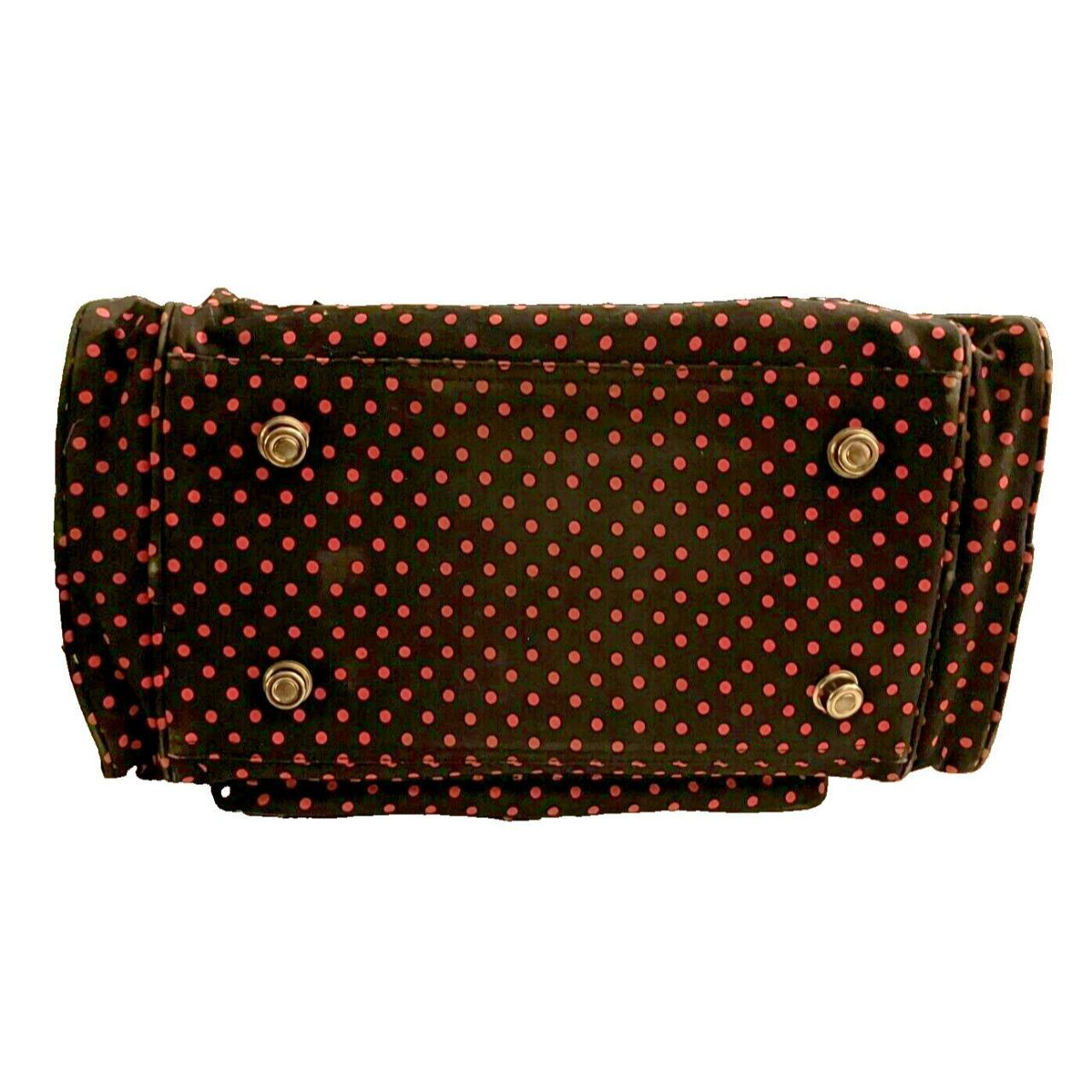 This stylish polka dot duffle bag from Totes is... - Depop