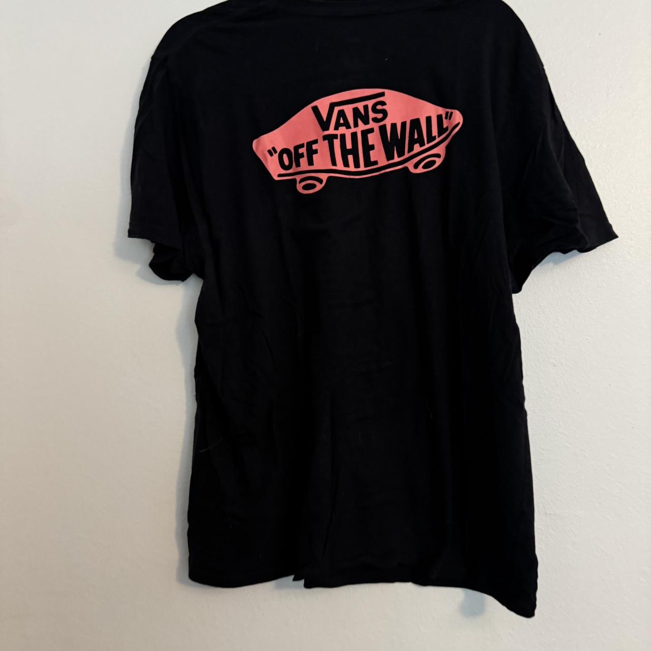 Black vans tshirt with neon pink logo has some. Depop