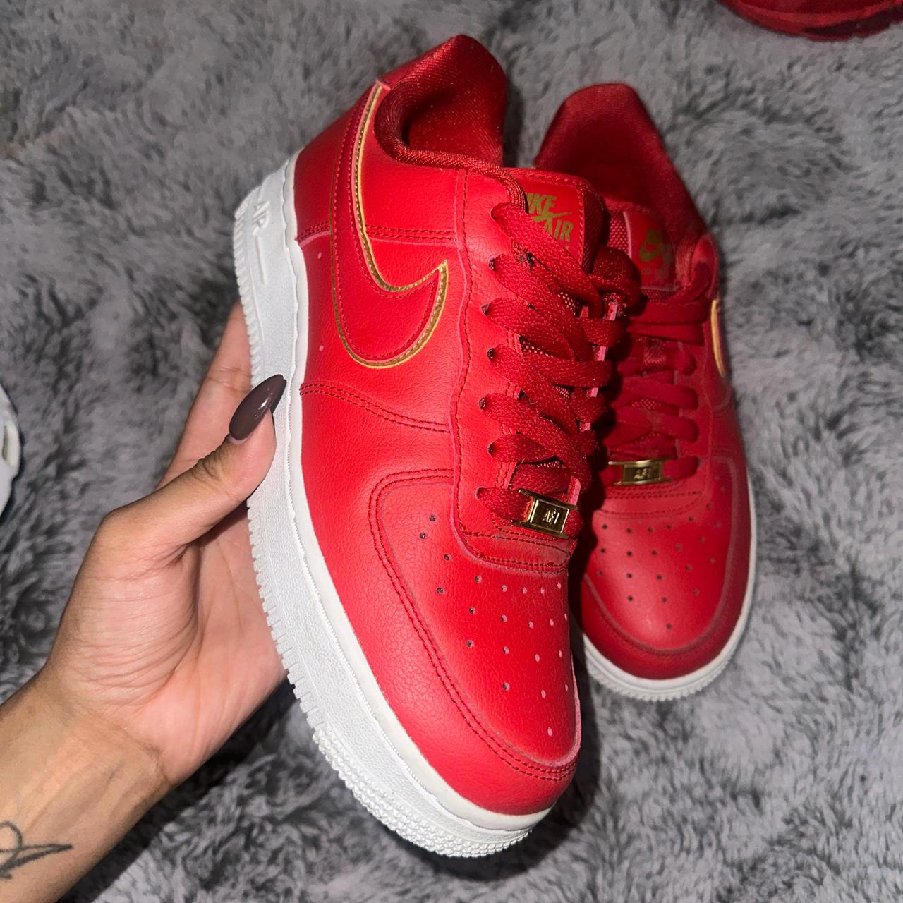 red nike with gold swoosh
