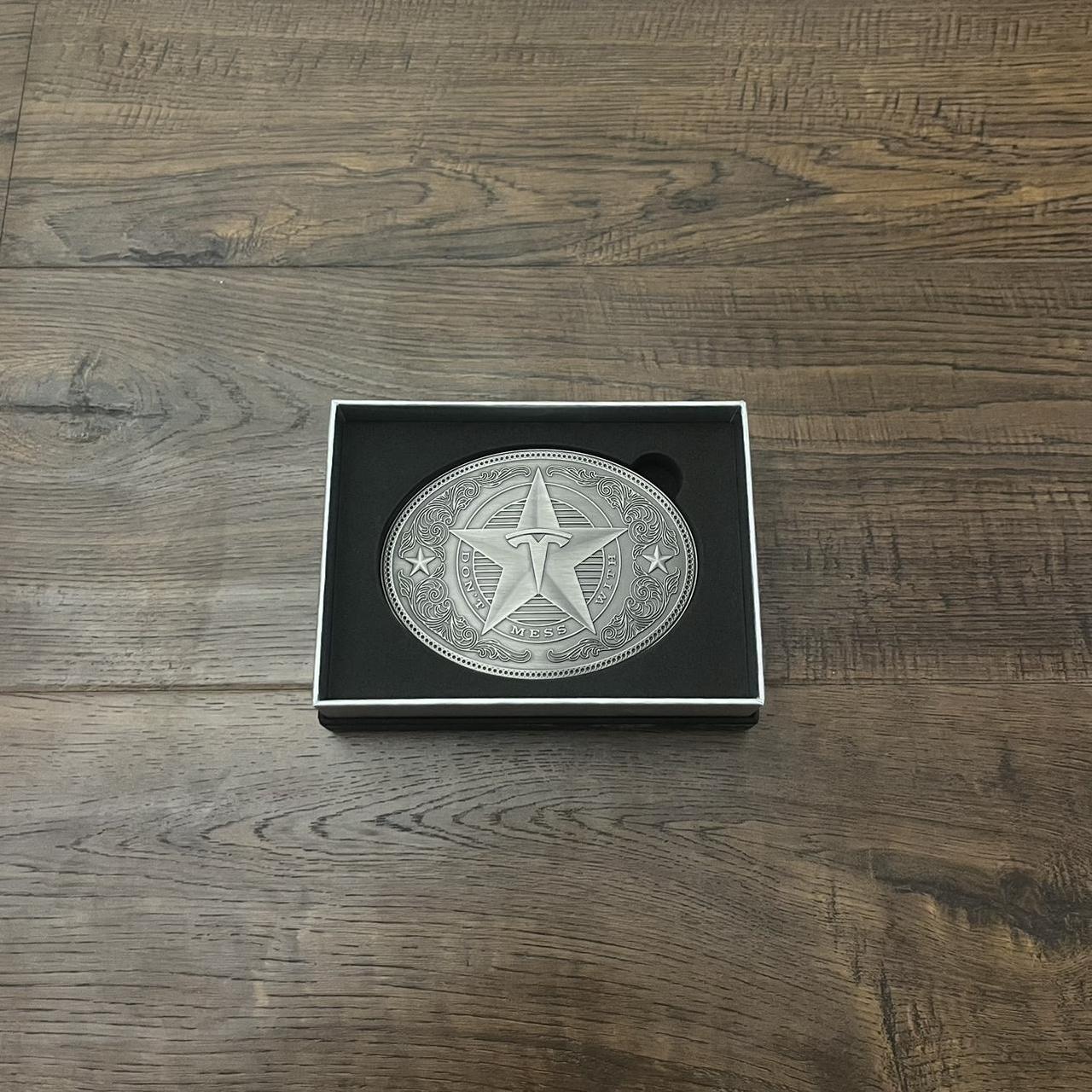 Tesla Giga cheapest Texas Belt Buckle