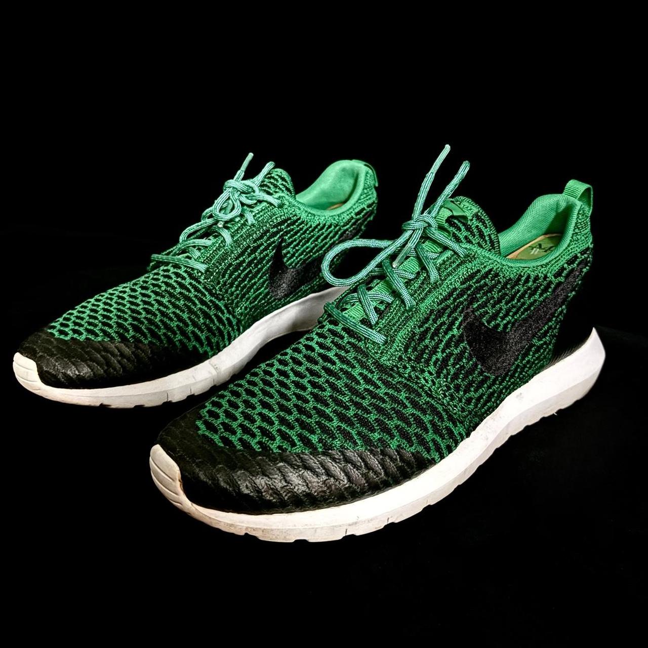 green and black roshe runs