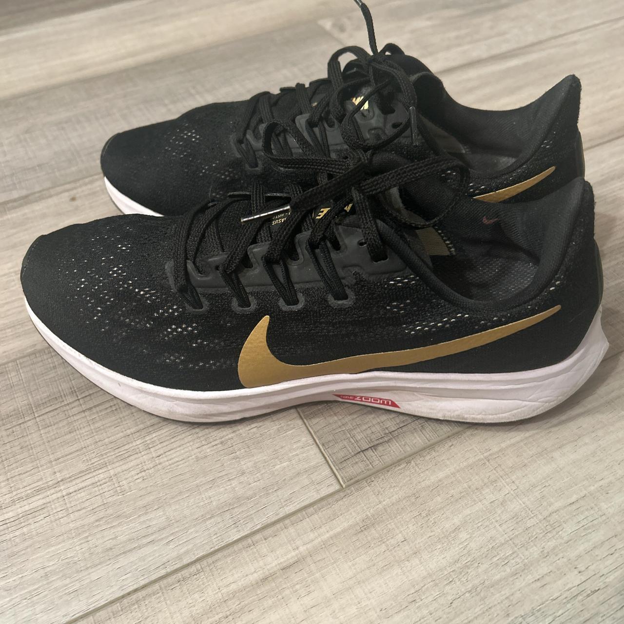 womens nike black and gold