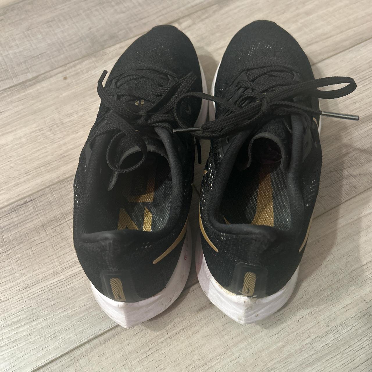 womens nike black and gold