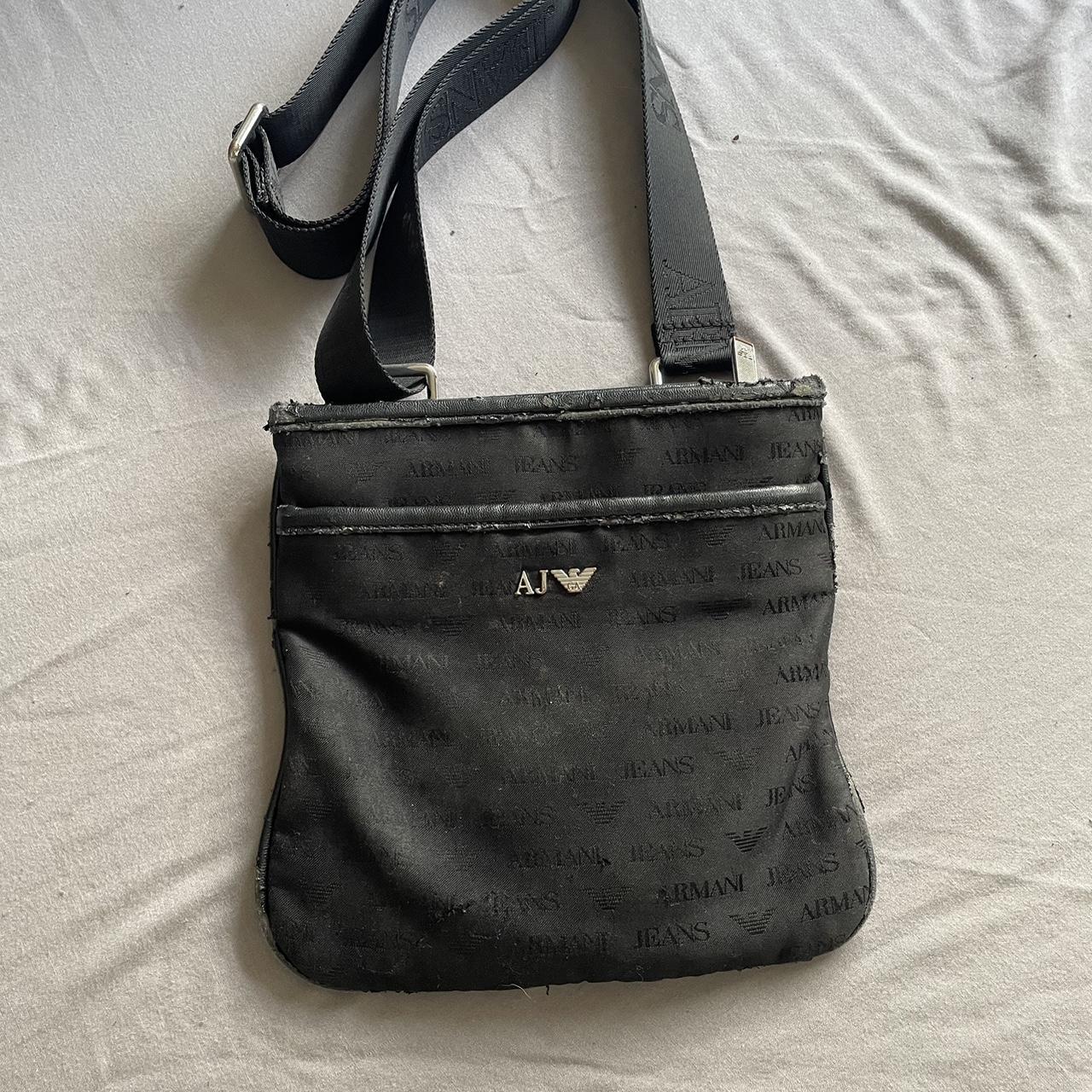 Black Armani pouch some wear and tear but good