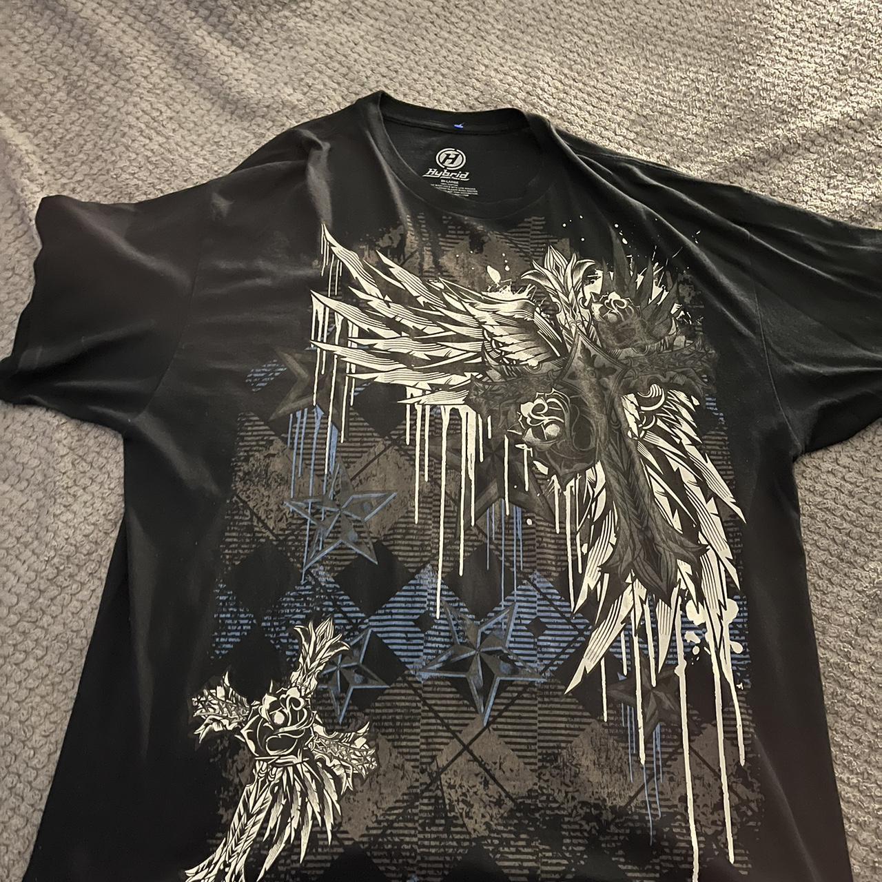 Hybrid black shirt with so much amazing design... - Depop