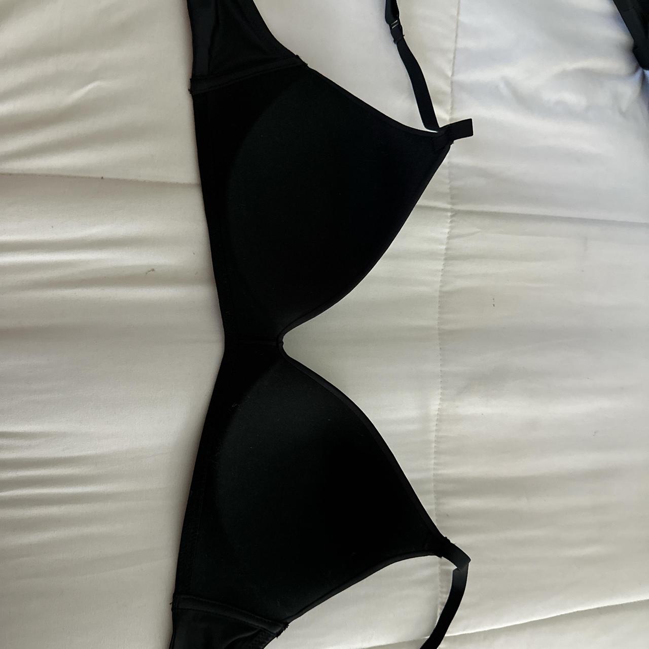 SKIMS black wireless bra size 34b. Not used. - Depop