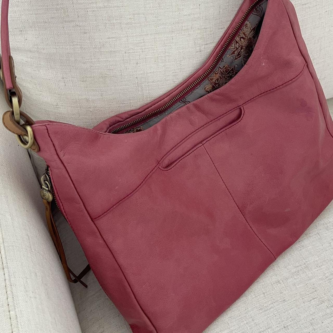 Pink Hobo International handbag retailer