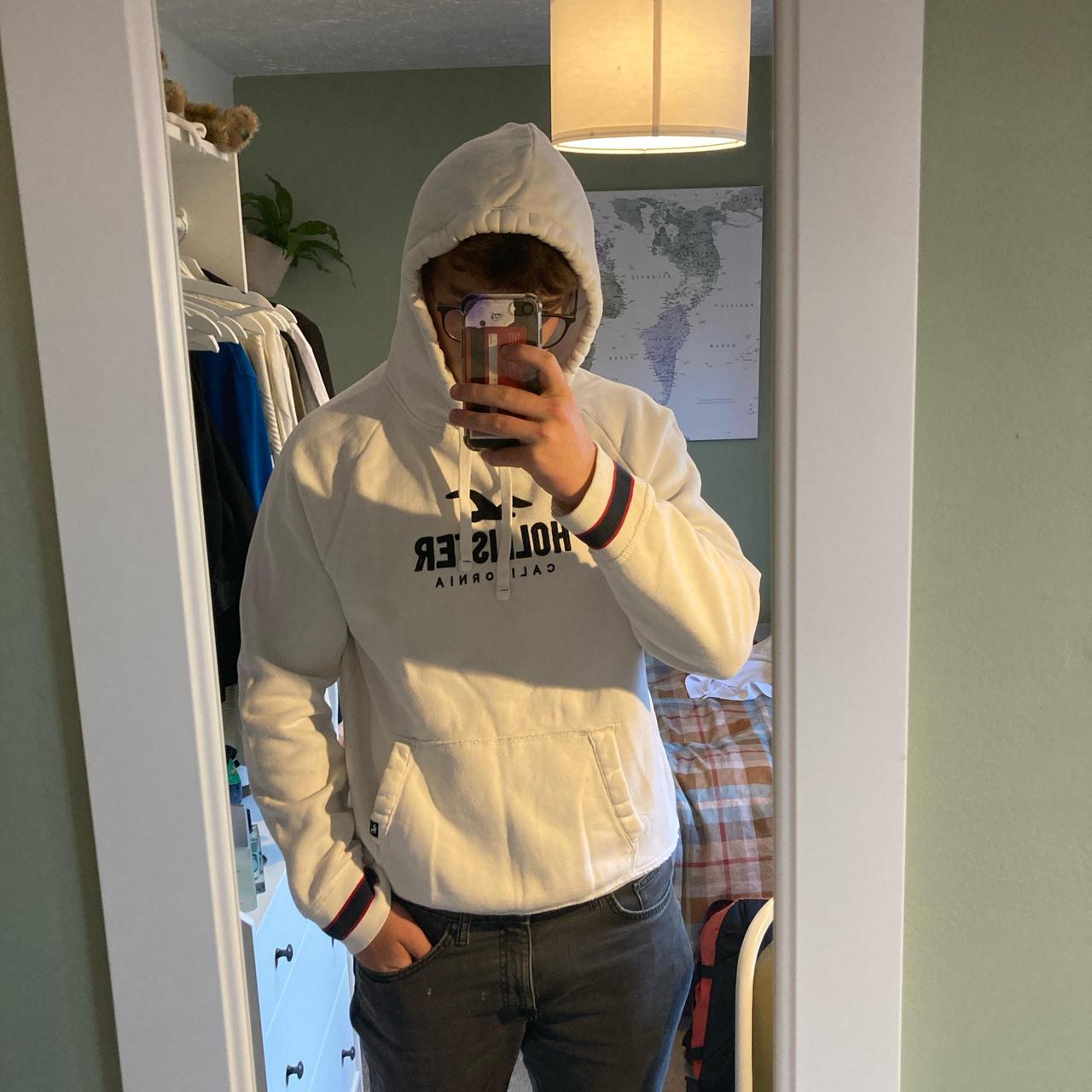 White Hollister hoodie a few small stains one on. Depop