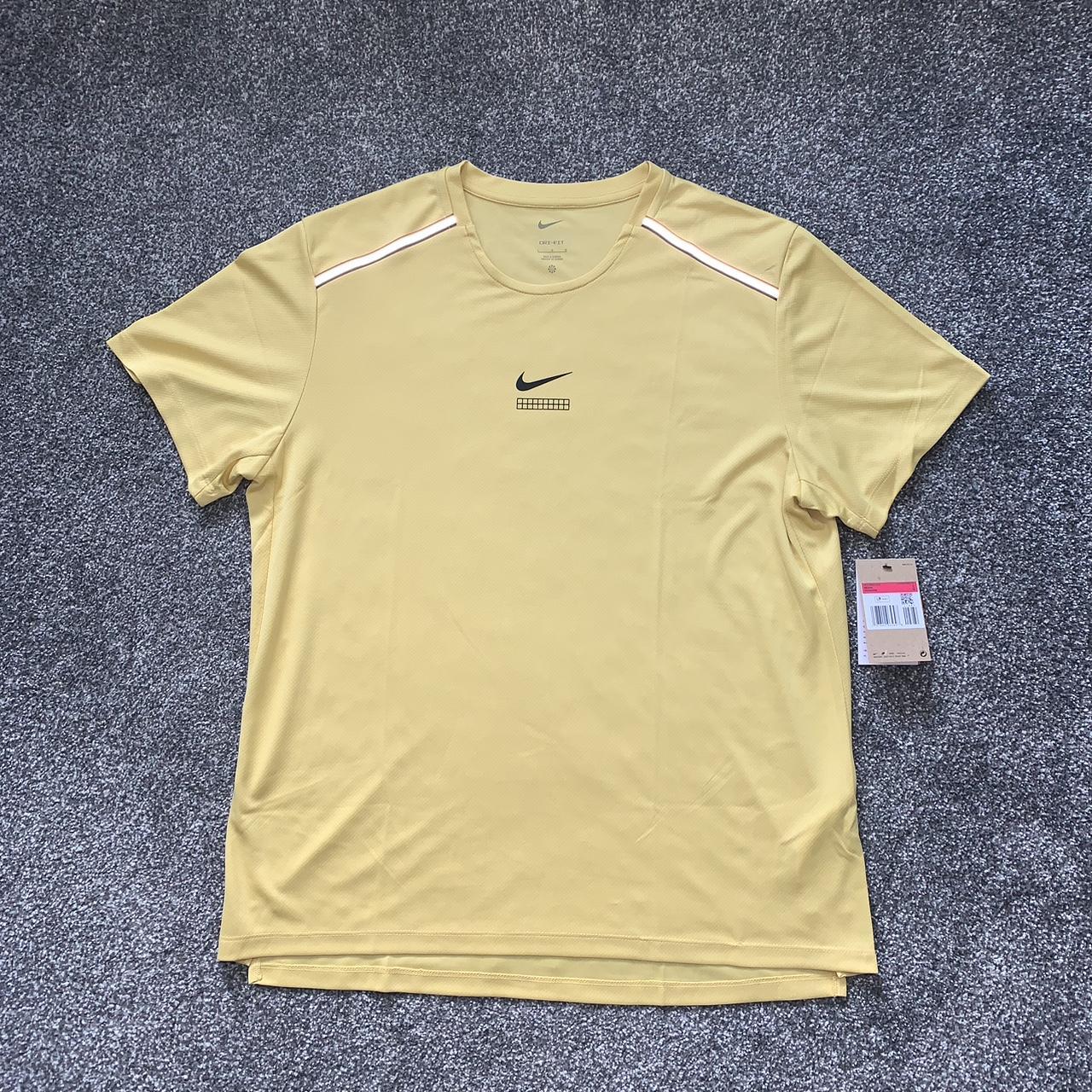 beige nike miler