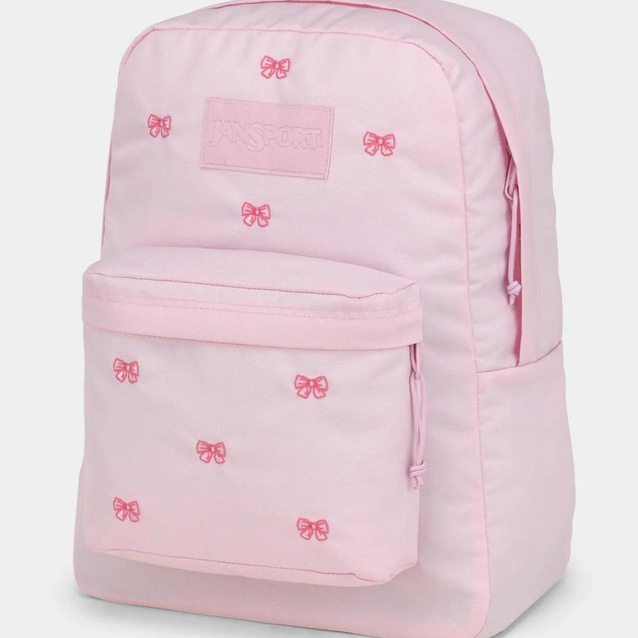Jansport Pink bow backpack (PREORDER) Takes about a... - Depop
