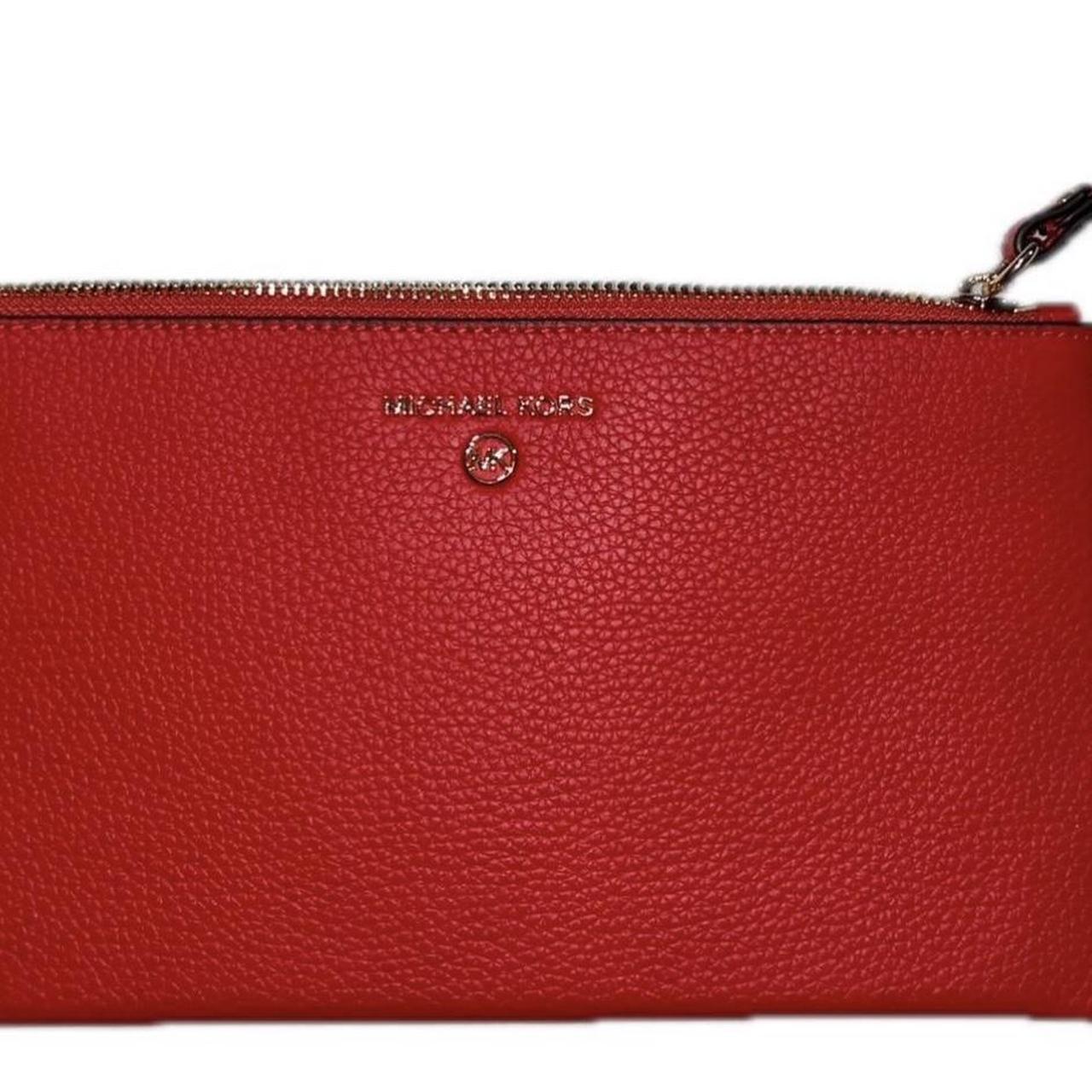 Michael Kors red wristlet bought and larger than I. Depop