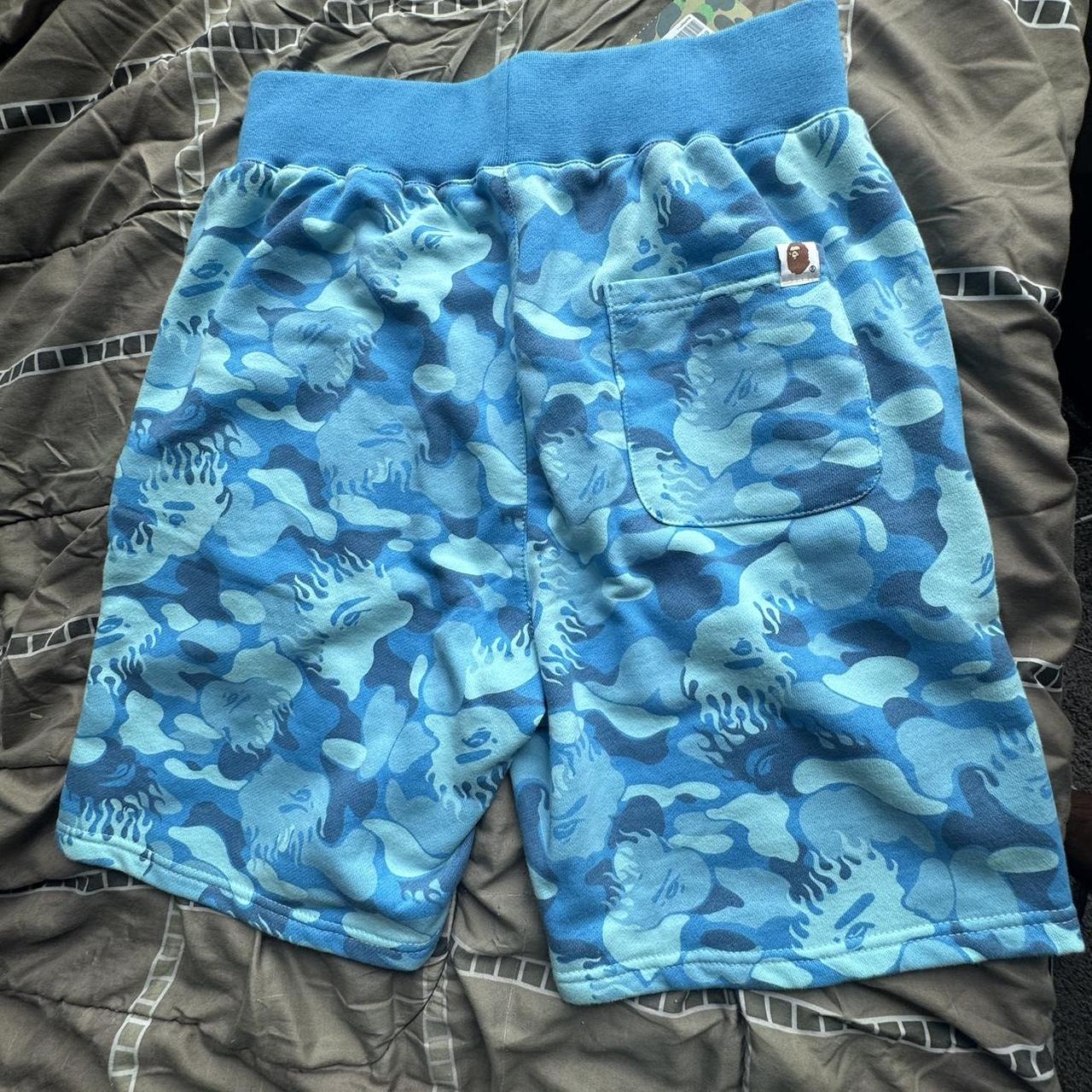 Blue bape fire camo shorts - Depop