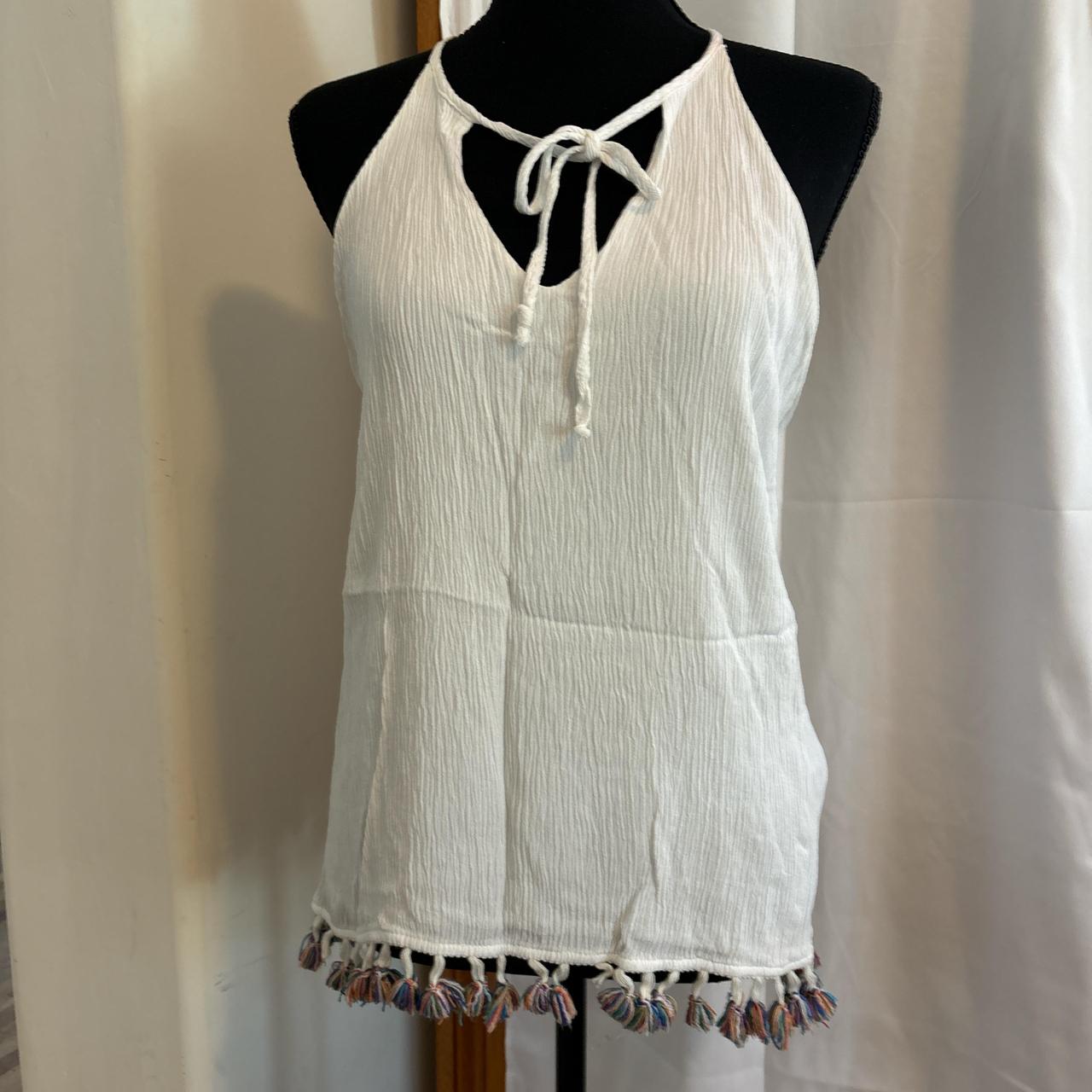 White tank with tie at top, multicolored fringes on... - Depop
