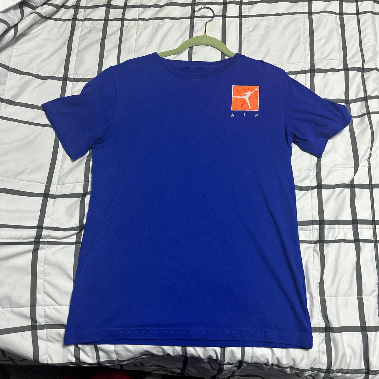 Dark blue and orange Jordan shirt